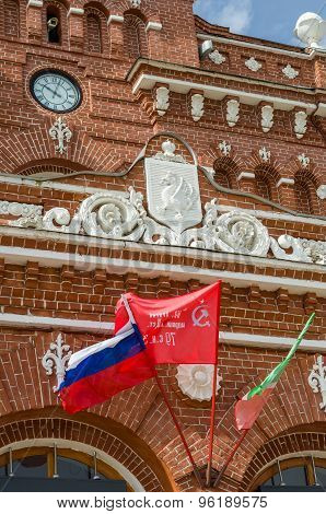 Clock And National Flags On The Railway Station In Kazan.