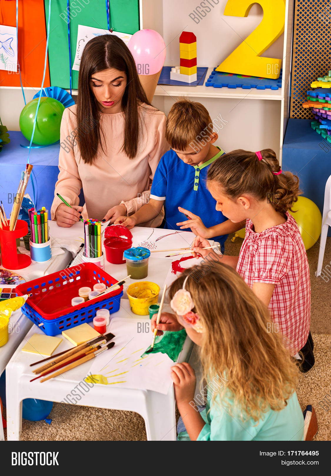children painting and drawing in kids club craft lesson in primary school kindergarten teacher - Children Painting Images children painting and drawing in kids club craft lesson in primary school kindergarten teacher - Children Painting Images