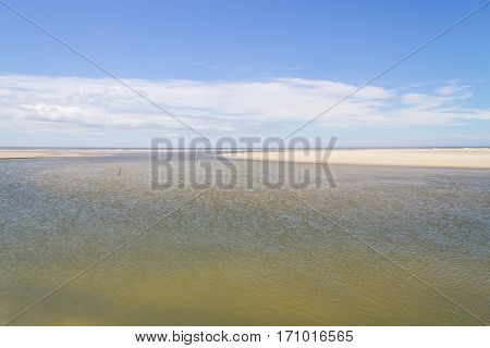 Water Channel And Dunes In The Tavares Beach
