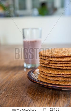 Smoothie And Biscuits On A Wooden Table