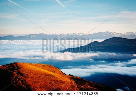 Aerial view of the alpine valley in sunlight. Dramatic and gorgeous morning scene. Location place National Park Gardena, Seceda peak, Dolomiti. Tyrol, Italy, Europe. Beauty world. Drone photography.
