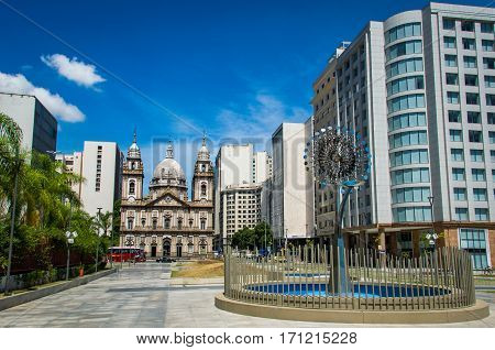 Rio de Janeiro, Brazil - February 10, 2017: The Olympic Pyre of Rio 2016 Games in city center with Candelaria Church in the background.