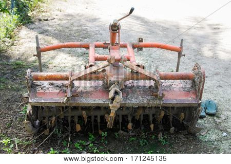 Detail of parking dirty rotary harrow plow