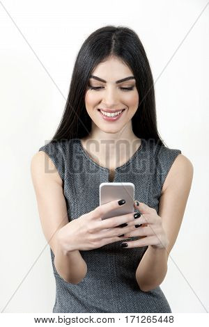 Businesswoman Text Messaging On Cellphone