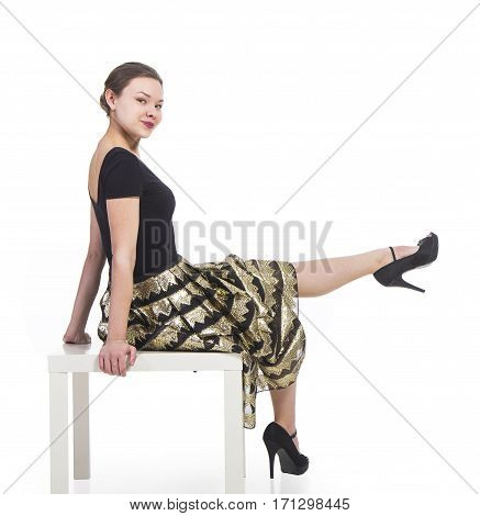 Young smiling girl . Studio shot on white background.