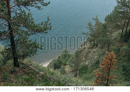 Mountain and sea. Nature composition. Wildlife Reserve Baikal. Hiking in the small mountain ranges. Lake View from a height.