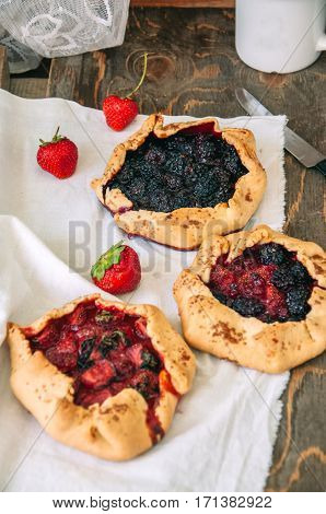 Summer gallete with mix of berries. Rustic style.