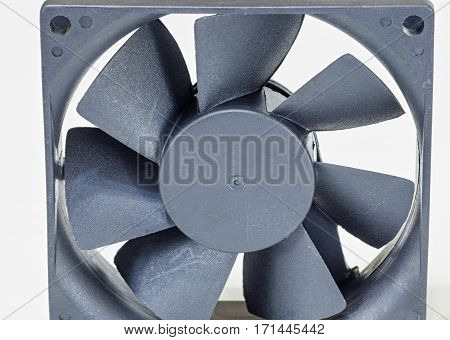 Computer fan covered in a lot of dust isolated on white