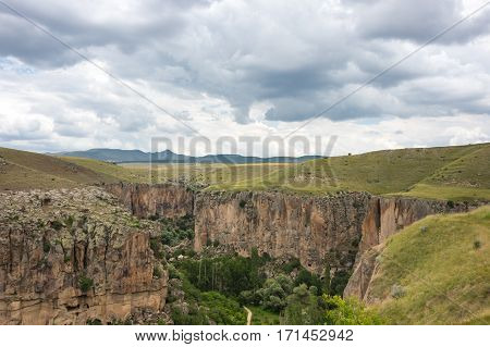 Ihlara Valley is a 16 km long gorge cut into volcanic rock in the southern part of Cappadocia Turkey