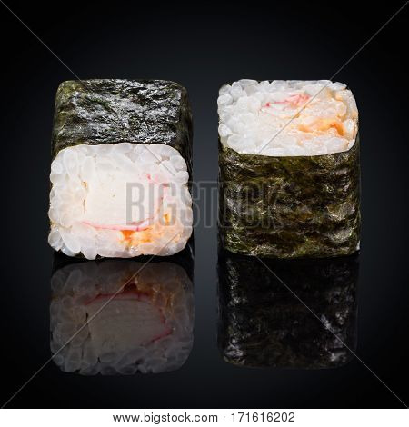 Roll Spicy Kani Maki crab, spicy sauce on a black background