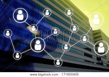 Double exposure of man arms crossed and icon social media connection concept with blurred background of office building, color tone effect.