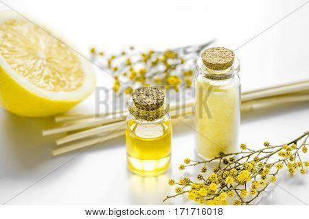 Cosmetic set for spa with organic aroms oils and sea salt for bath on white background