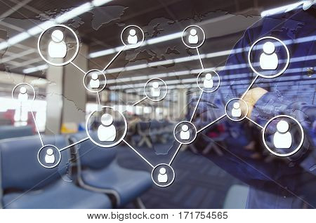 Double exposure of man and cross one's arm and icon social media connection concept with airport blurred background, color tone effect.