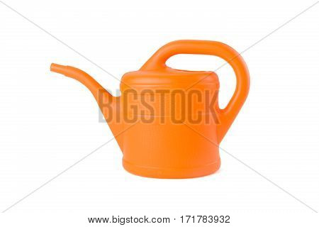 orange watering can on white background studio shot