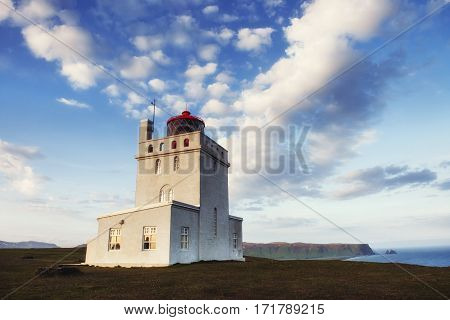 Beautiful white lighthouse at Cape Dyrholaey, South Iceland