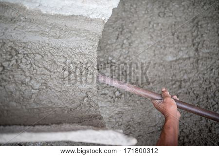 Concrete pouring during commercial concreting floors of building