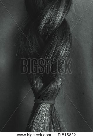 A beautiful plait on a woman's back