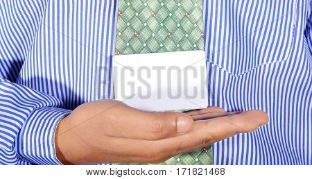 Hand holding card isolated on white background professionall