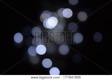 A bokeh abstract light and dark background.