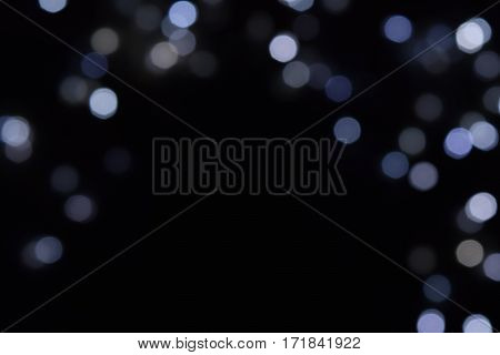Abstract of lighting bokeh on dark background.