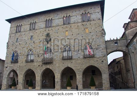 Italy Pistoia - November 27 2016: the view of Palazzo del Comune City Hall Municipial museum of Pistoia on November 27 2016 in Pistoia Tuscany Italy.