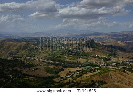 Calascibetta and its territory on a summer day with clouds in the sky
