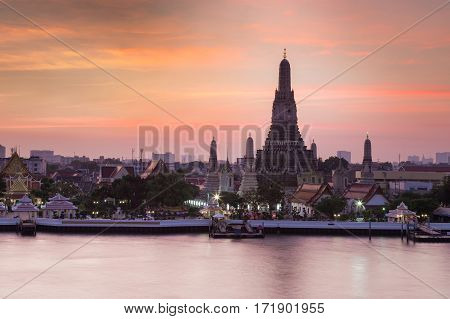Dramatic sky after sunset over Arun temple river front Bangkok Thailand Landmark