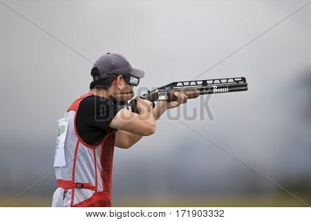 Rio Brazil - august 10 2016: HU Binyuan (CHN) during Double Trap Men at Olympic Games 2016 in Olympic Shooting Centre Deodoro