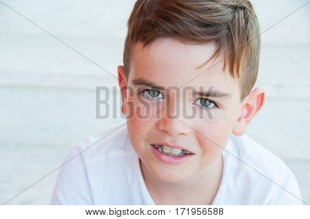 Portrait of a cute child with frackles