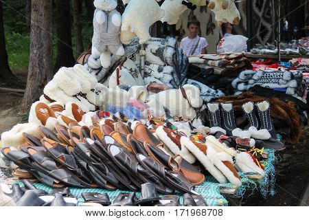 Schodnica Ukraine - June 30 2014: People near trade stalls with ukrainian souvenirs