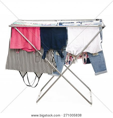 The Clothes Drying Rack With Clen Clothes On White Backgrouns Isolation