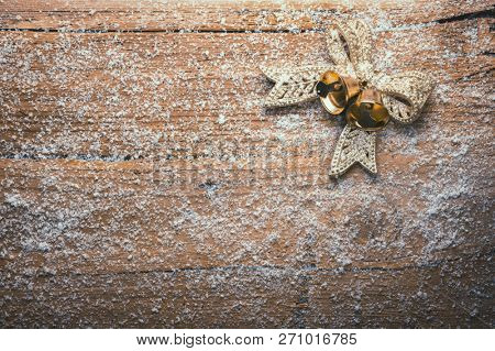bow on froozen wooden wall, christmas background 