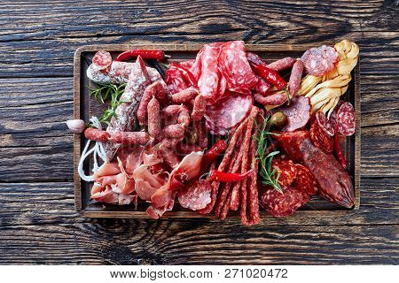 Set Of Meat Appetizer - Jamon, Chistorra, Chorizo, Salchichon, Fuet, Olives, Tomatoes, Chili Peppers