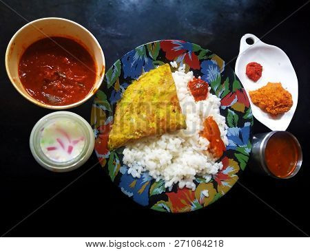 Kerala Style Spicy Rice,curry,chandni And Fish Curry