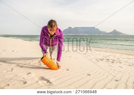 Fitness Model Exercising In Front Of Table Mountain