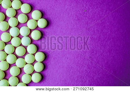Small Yellow Orange Beautiful Medical Pharmaceptic Round Pills, Vitamins, Drugs, Antibiotics On A Pi