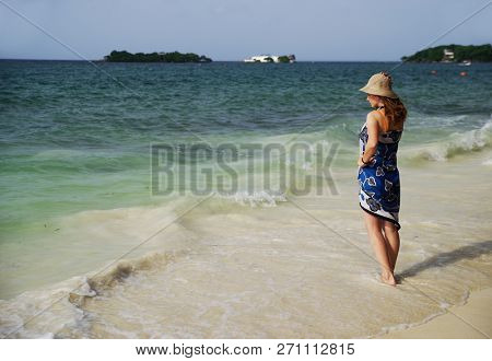 Young girl enjoying the carribean landscape, Colombia, South America