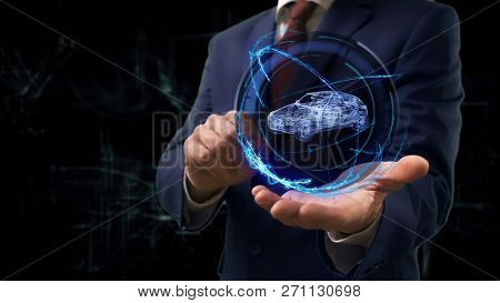Businessman Shows Concept Hologram 3d Family Car On His Hand. Man In Business Suit With Future Techn