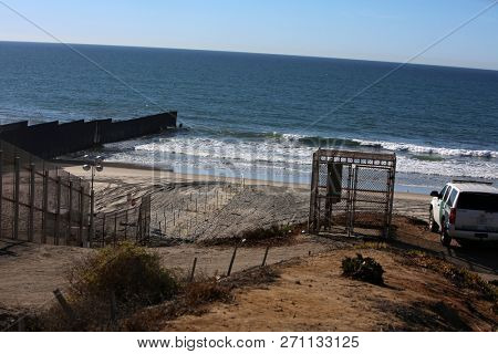 San Ysidro, California - 11/26/2018: Border and new fencing along the international border between San Diego, California and Tijuana, Mexico leads into the pacific ocean. 
