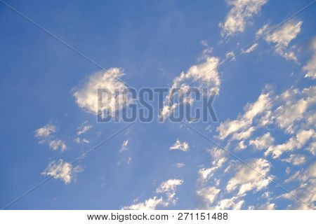Beautiful Wavy White Clouds Against Blue Sky For Background Texture