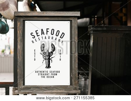 Rustic style sign mockup at a seafood restaurant