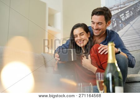  Couple inlove exchanging gifts for Valentin'es Day                              