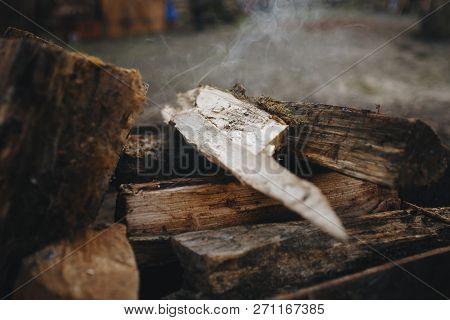 Bonfire In The Grill. Punctured Firewood Lies In A Fire In A Metal Forged Brazier. Fire And Smoke Ar