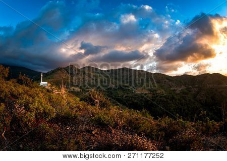 Troodos Mountainscape With The Holy Cross Church At The Top Of The Fidkias Hill. Pedoulas Village, N