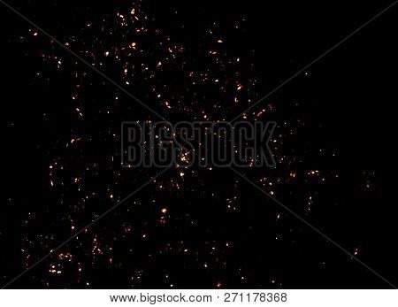 Fire Sparks Came From Campfire Isolated On Textire Black Background For Overlay Design Or Screen Ble