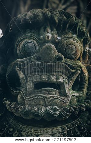 Closeup Portrait Of Hindu Buddhist Traditional Stone Sculpture. Bali, Indonesia
