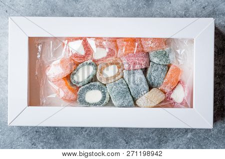 Fruity Turkish Delight Roll Shaped In Pastic Box / Container Or Package.