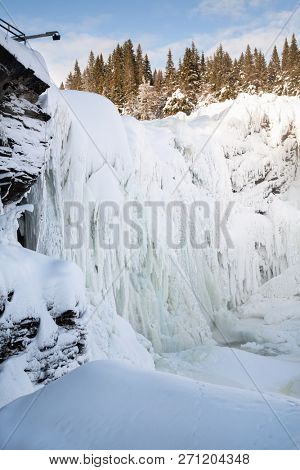 frozen waterfall Tannforsen in winter, Sweden