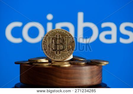 Tula, Russia - August 28, 2018 Bitcoin Btc On Stack Of Cryptocurrencies With Coinbase Logo In Backgr