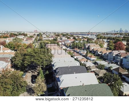 Top View Typical Residential Neighborhood With Downtown Chicago In Background